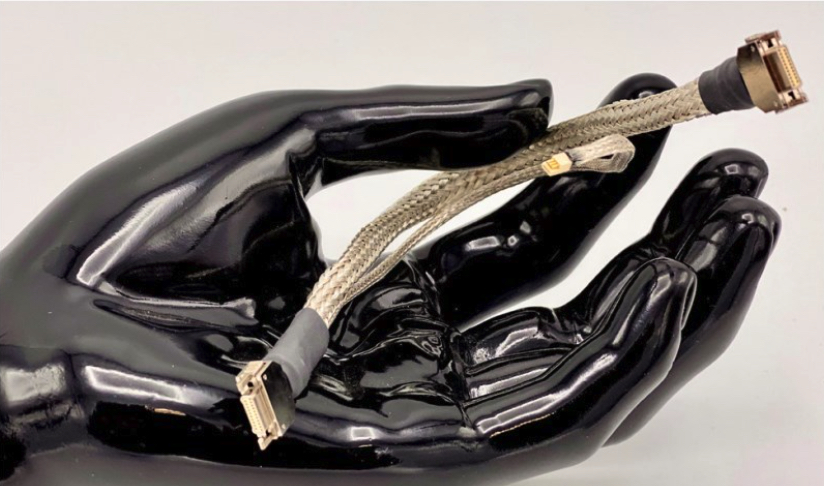 Robotic Hand Holding Nano-D Connector